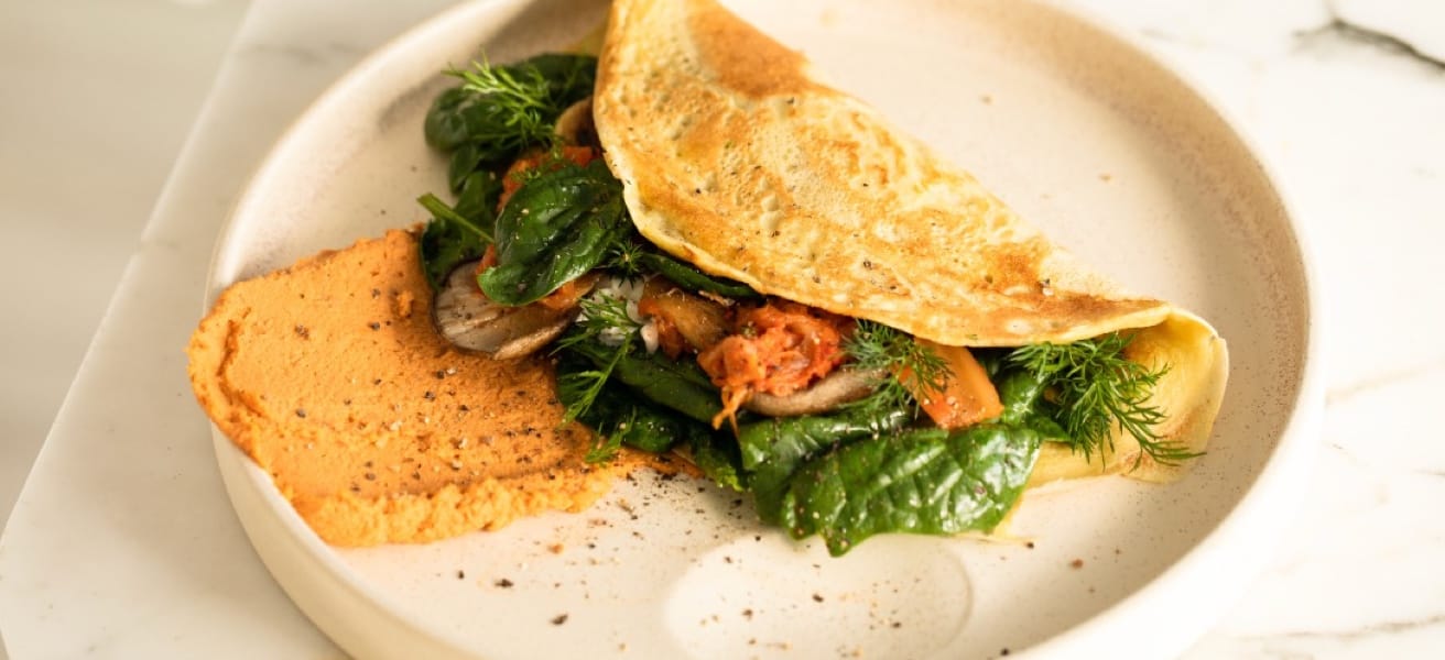 Simple omelette on a white plate